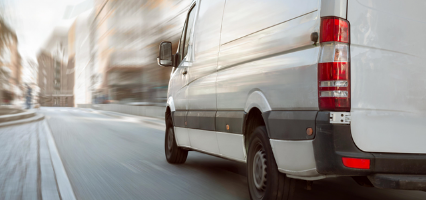 Van delivering packages in the city